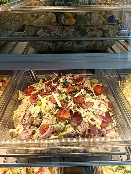Fresh salads in the deli display at Athelstone Take Away